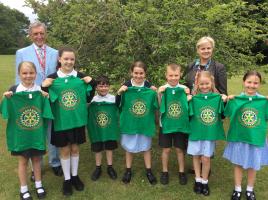 Pupils from Creech St Michael Primary School with Rotarians Tracy Khodabandehloo and Tony Murray